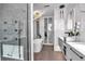Elegant bathroom showcasing a freestanding tub, glass shower, and marble accents for a modern design at 449 S 12Th St # 504, Tampa, FL 33602