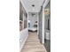 Hallway view into the bedroom and bathroom, featuring modern sliding door at 449 S 12Th St # 504, Tampa, FL 33602