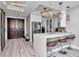 Modern kitchen with white cabinets, stainless steel appliances, and a breakfast bar creates a sleek and functional space at 449 S 12Th St # 504, Tampa, FL 33602