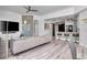 Bright living room featuring modern decor, sleek flooring, and an open layout connecting to the kitchen at 449 S 12Th St # 504, Tampa, FL 33602