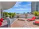 Expansive patio with lounge seating and city views, perfect for outdoor relaxation and entertaining at 449 S 12Th St # 504, Tampa, FL 33602