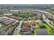 A high angle shot showing the property and it's location with access to a beautiful lake at 4506 Stickley Ct, Palmetto, FL 34221
