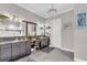 Bathroom with dual sink vanity, decorative mirrors, and stylish lighting fixtures at 4506 Stickley Ct, Palmetto, FL 34221