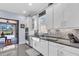 Beautiful kitchen showcasing white cabinets, stainless steel appliances, and granite countertops at 4506 Stickley Ct, Palmetto, FL 34221