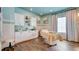 Beautiful spa room featuring a massage table, vanity, and decor at 4506 Stickley Ct, Palmetto, FL 34221