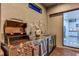 Well-equipped outdoor summer kitchen features a grill, sink, and stainless steel appliances, perfect for outdoor entertaining at 4506 Stickley Ct, Palmetto, FL 34221