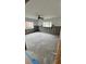 Bedroom undergoing renovation with exposed walls and natural light, offering a blank canvas for personalization at 4550 Overlook Ne Dr # 156, St Petersburg, FL 33703