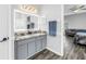 Bright bathroom featuring a double sink vanity with granite countertops and modern fixtures at 511 York Dale Dr, Ruskin, FL 33570