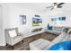 Comfortable living room features stylish furniture, a ceiling fan, and attractive flooring at 511 York Dale Dr, Ruskin, FL 33570