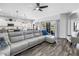 Inviting open concept living area with hardwood floors, and views to the kitchen and outdoor patio at 511 York Dale Dr, Ruskin, FL 33570