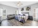 A spacious main bedroom features a seating area, stylish decor, and plenty of natural light at 511 York Dale Dr, Ruskin, FL 33570