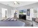 The bedroom with an ensuite bathroom and walk-in closet has ample living space and outdoor views at 511 York Dale Dr, Ruskin, FL 33570
