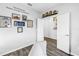 Home office featuring decor, framed photos and memorabilia with wood floors at 511 York Dale Dr, Ruskin, FL 33570