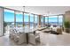 Open-concept living room with floor-to-ceiling windows and contemporary furnishings at 520 N Tampa St # 2303, Tampa, FL 33602