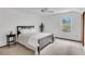 Comfortable bedroom with white walls, ceiling fan, closet and carpet flooring at 5207 Moeller Ave, Sarasota, FL 34233
