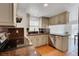 Functional kitchen featuring granite counters, stainless steel appliances, and a convenient layout for efficient meal preparation at 5207 Moeller Ave, Sarasota, FL 34233