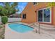 A refreshing splash pool invites relaxation, with modern finishes complemented by the vibrant outdoor scenery at 5207 Moeller Ave, Sarasota, FL 34233