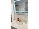 Bathroom sink featuring a modern, illuminated mirror at 6000 20Th N St # 138, St Petersburg, FL 33714