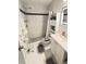 Bright bathroom featuring white tile, modern fixtures, and a glass shower at 6000 20Th N St # 138, St Petersburg, FL 33714