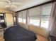 Bright bedroom featuring large windows and lots of natural light at 6000 20Th N St # 138, St Petersburg, FL 33714