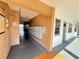 Apartment complex hallway featuring brick walls, mailboxes, and tiled floors at 6000 20Th N St # 138, St Petersburg, FL 33714