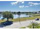Scenic community lake view surrounded by lush greenery and well-maintained buildings at 6000 20Th N St # 138, St Petersburg, FL 33714