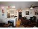 Inviting living room featuring hardwood floors, lots of decorations, and an adjacent view of the kitchen at 6000 20Th N St # 138, St Petersburg, FL 33714