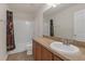 Full bathroom featuring a shower and tub combo with an extended vanity at 662 Petal Mist Ln, Brooksville, FL 34604