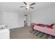 Bedroom with neutral walls, closet, and carpeted floors at 662 Petal Mist Ln, Brooksville, FL 34604