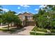 Lovely two-story home with a paved driveway and manicured landscaping in a desirable neighborhood at 7029 Dowling Mill Cir, Tampa, FL 33625