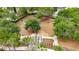 Aerial view of a fenced dog park featuring shaded areas, walking paths, and agility equipment for pet owners at 7511 Turtle View Dr, Ruskin, FL 33573