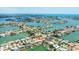 Aerial shot of waterfront property location, displaying proximity to the ocean, docks, and a vibrant community at 7889 3Rd S Ave, St Petersburg, FL 33707