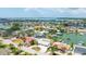 An aerial view showing waterfront properties and boat docks, exemplifying a luxurious, boater-friendly community at 7889 3Rd S Ave, St Petersburg, FL 33707