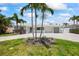 Inviting single-story home with well-maintained landscaping and a spacious driveway at 7889 3Rd S Ave, St Petersburg, FL 33707