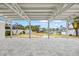Spacious outdoor patio with a beautiful waterfront view overlooking a boat dock at 7889 3Rd S Ave, St Petersburg, FL 33707
