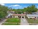 Well-maintained exterior with a green lawn and driveway at 8141 82Nd Ave, Seminole, FL 33777