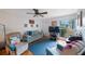 Cozy living room with hardwood floors, comfortable seating, and a large window offering plenty of natural light at 8141 82Nd Ave, Seminole, FL 33777