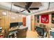 Spacious office with wood paneled walls, decorative ceiling, and bright lighting at 8141 82Nd Ave, Seminole, FL 33777