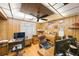 Spacious office with wood paneled walls, decorative ceiling, and bright lighting at 8141 82Nd Ave, Seminole, FL 33777