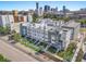 Aerial view of newly constructed townhomes featuring manicured lawns and modern architecture at 883 6Th S Ave, St Petersburg, FL 33701