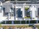 Aerial view of rooftops showing outdoor entertaining spaces and lush plantings at 883 6Th S Ave, St Petersburg, FL 33701