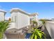 Stylish rooftop deck with comfortable seating, lush plants, and a modern outdoor rug at 883 6Th S Ave, St Petersburg, FL 33701