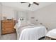 Cozy bedroom with soft natural lighting and warm wood accents at 9481 Highland Oak Dr # 313, Tampa, FL 33647