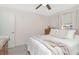 Bedroom features a neutral color scheme, dresser, and ample natural light at 9481 Highland Oak Dr # 313, Tampa, FL 33647
