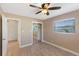 Bedroom featuring neutral walls, two windows and an mirrored-door closet at 226 75Th N St, St Petersburg, FL 33710