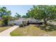 Beautiful single-story home featuring a well-kept lawn and cozy carport at 226 75Th N St, St Petersburg, FL 33710