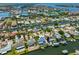 Aerial view showcasing waterfront community with easy boating access and lots of amenities at 1011 Spindle Palm Way, Apollo Beach, FL 33572