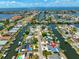 Aerial view of waterfront community, pinpointing property's location, close to the ocean at 1011 Spindle Palm Way, Apollo Beach, FL 33572