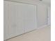 Bedroom with tile flooring and a spacious closet at 1011 Spindle Palm Way, Apollo Beach, FL 33572