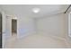Spacious bedroom with tile flooring, window and walk-in closet at 1011 Spindle Palm Way, Apollo Beach, FL 33572